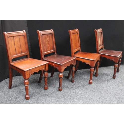 213 - A set of four Gothic Revival pine hall/rectory chairs (4)