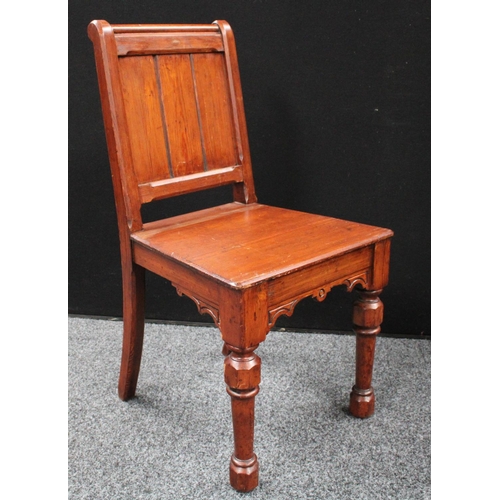 213 - A set of four Gothic Revival pine hall/rectory chairs (4)