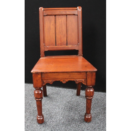 213 - A set of four Gothic Revival pine hall/rectory chairs (4)