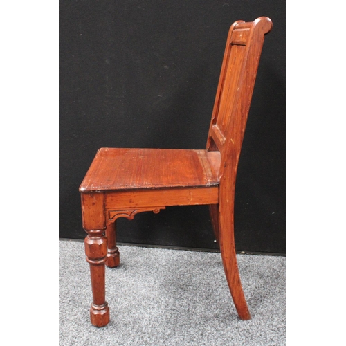 213 - A set of four Gothic Revival pine hall/rectory chairs (4)