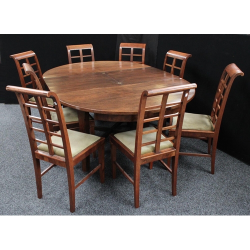 215 - An early-mid 20th century extending dining table, opening to 189.5cm; a set of eight conforming side... 