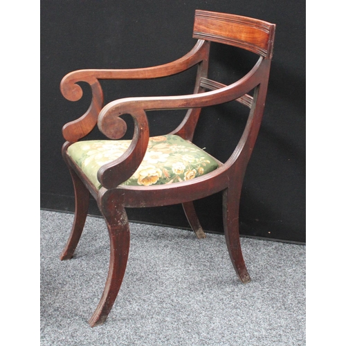 216 - A 'set' of four Regency mahogany dining chairs, comprising a carver and three side chairs (4)