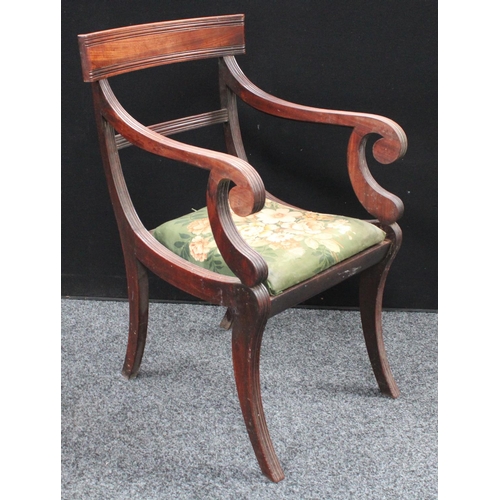 216 - A 'set' of four Regency mahogany dining chairs, comprising a carver and three side chairs (4)