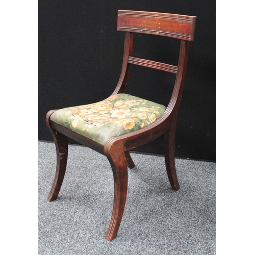 216 - A 'set' of four Regency mahogany dining chairs, comprising a carver and three side chairs (4)