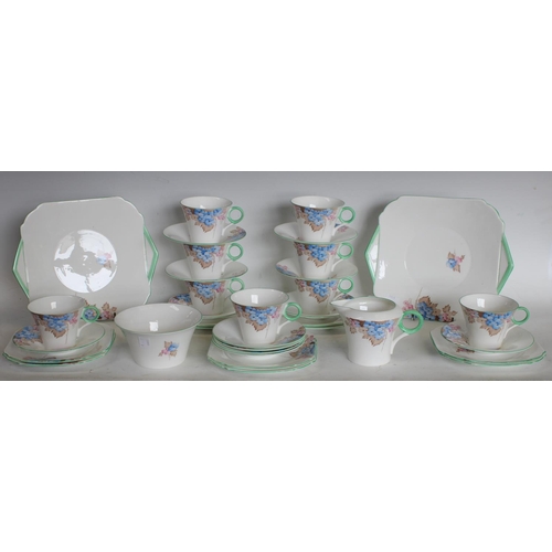 231 - A Shelley floral pattern part tea service comprising 9 cups, 12 saucers, 10 side plates, 2 cake plat... 