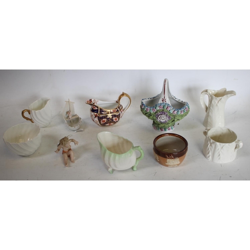 234 - A Royal Crown Derby 2451 pattern cream jug; a Royal Worcester leaf jug and sucrier; Coalport; Royal ... 