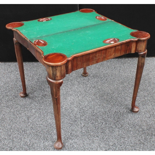 3 - A George II Irish mahogany concertina action card table, folding top enclosing an inset baize lined ... 