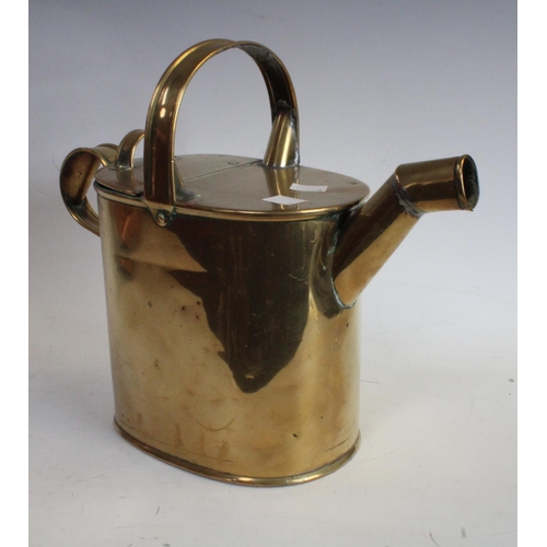 41 - Metalware - an 18th/19th century copper bysantine hammered vessel planter, a teapot;  a brass wateri... 