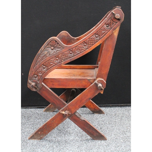 52 - A late 19th/early 20th century 'Glastonbury' chair, 83cm high