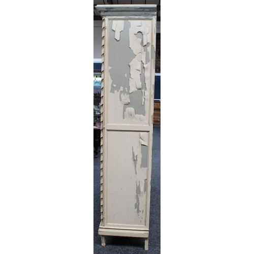 55 - A Louis XVI style painted three door wardrobe/armoire, outswept cornice above a large central mirror... 