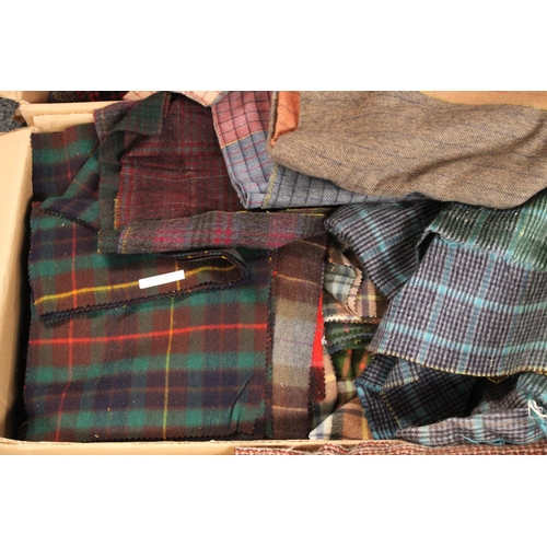 557 - Textiles - an extensive quantity of fabric samples and swatches, mainly cashmere, tartans etc in eig... 