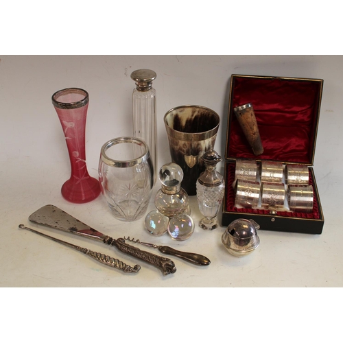 570 - An Edwardian silver mounted beaker, Birmingham 1904; silver mounted scent bottles; a set of six silv... 