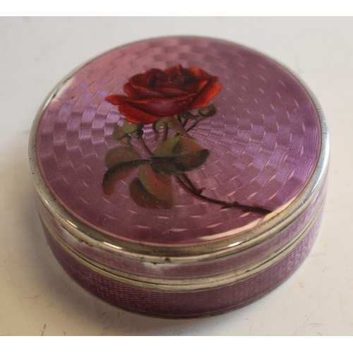 583 - An early 20th century silver and enamel circular snuff box, c.1920