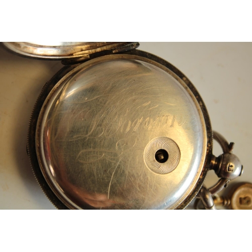 588 - A silver full hunter pocket watch, Burman, Manchester, hallmarked Birmingham 1886; a silver Albert c... 