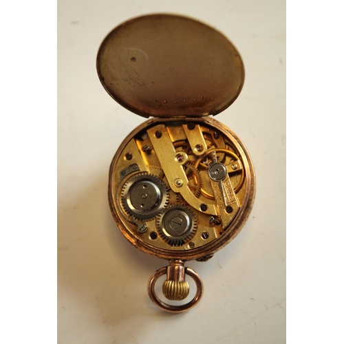 594 - A Cuivre ladies pocket watch, 9k gold case, gilt decorated white dial, Roman numerals