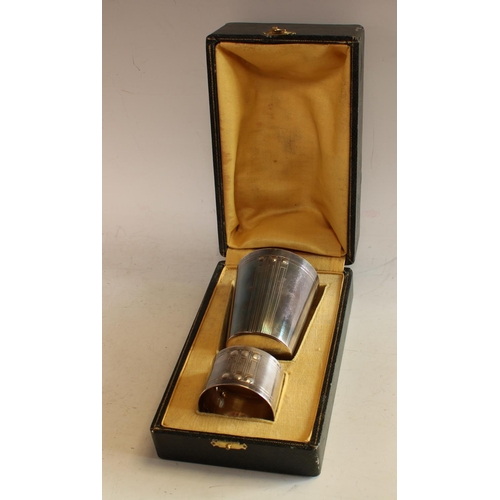 600 - A Secessionist silver plated beaker and napkin ring, boxed