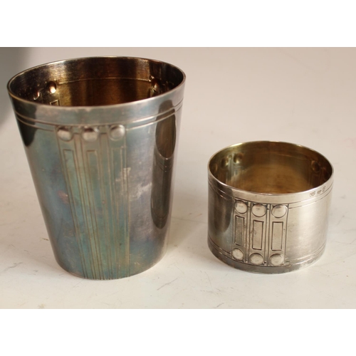 600 - A Secessionist silver plated beaker and napkin ring, boxed