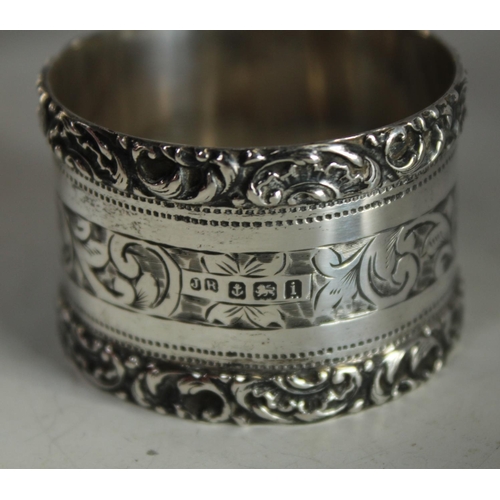 605 - A Victorian silver christening mug; an Edwardian silver napkin ring etc (4)