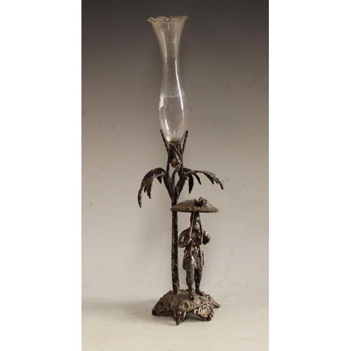 609 - An E.P.B.M figural table centre specimen vase, as an Ottoman soldier, he stands, holding a parasol, ... 