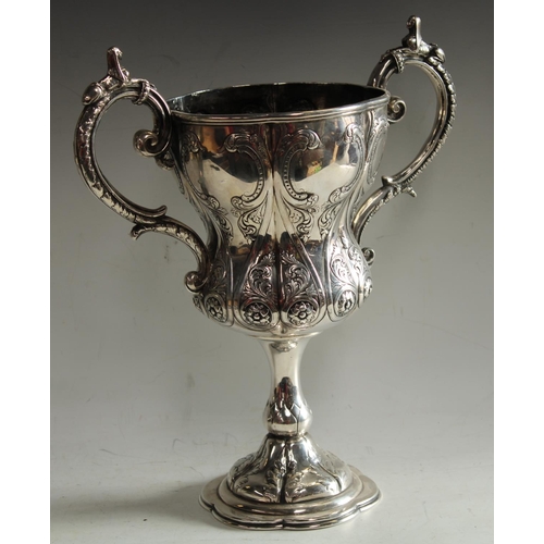 618 - A 19th century Anglo-Indian silver inverted ogee pedestal military  presentation cup, engraved with ... 