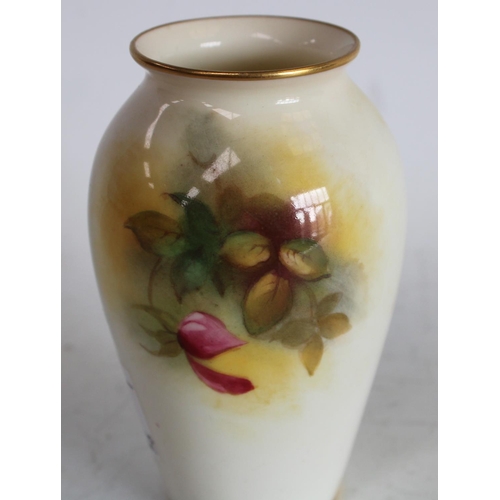 64 - A Royal Worcester ovoid vase, painted by Millie Hunt, signed, with roses, 9.75cm high, printed crown... 