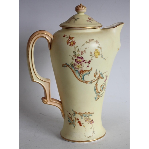 69 - A Royal Worcester coffee pot, yellow ground with floral decoration W4381 pattern