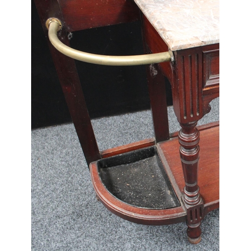 8 - A late 19th/early 20th century mahogany hall stand, outswept cornice above a bevelled rectangular mi... 