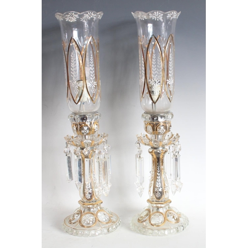 99 - A pair early 20th Century lustres and shades, clear glass, white enamel and gilt decoration, electri... 