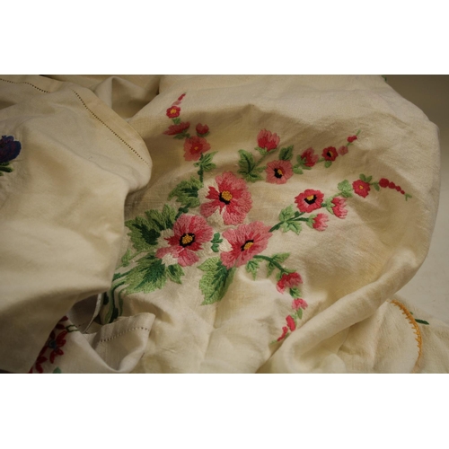 560C - Textiles - hand embroidered linen tablecloths including English country garden flowers; Crinoline la... 