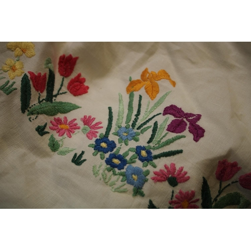 560C - Textiles - hand embroidered linen tablecloths including English country garden flowers; Crinoline la... 