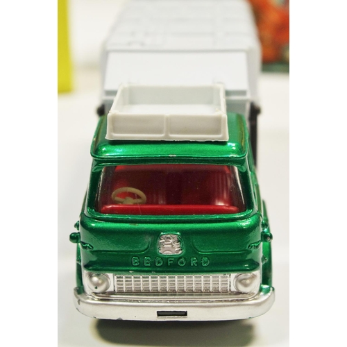 114 - Dinky 978 Bedford Refuse Wagon - metallic green cab, red interior and plastic hubs, light grey back ... 