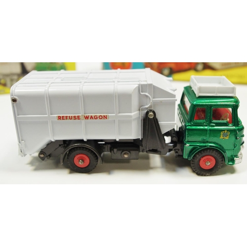 114 - Dinky 978 Bedford Refuse Wagon - metallic green cab, red interior and plastic hubs, light grey back ... 