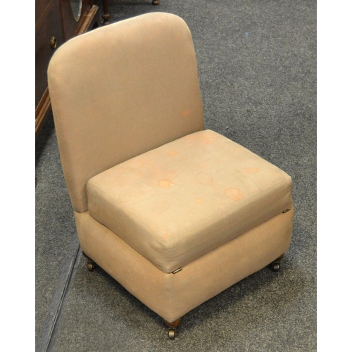 181 - An unusual Victorian child's hall chair with padded hinged seat opening to storage.