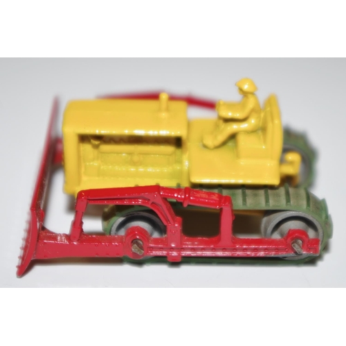 20 - Matchbox Regular Wheels 18a Caterpillar Bulldozer - yellow body and figure driver, red blade and arm... 