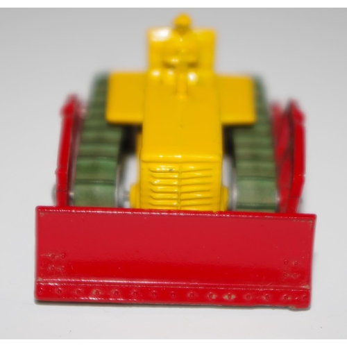 20 - Matchbox Regular Wheels 18a Caterpillar Bulldozer - yellow body and figure driver, red blade and arm... 