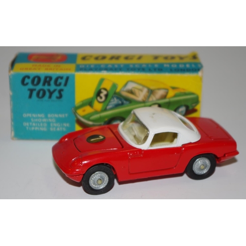 69 - Corgi Toys No.319 Lotus Elan Coupe with detachable chassis - red, white roof and interior, cast hubs... 