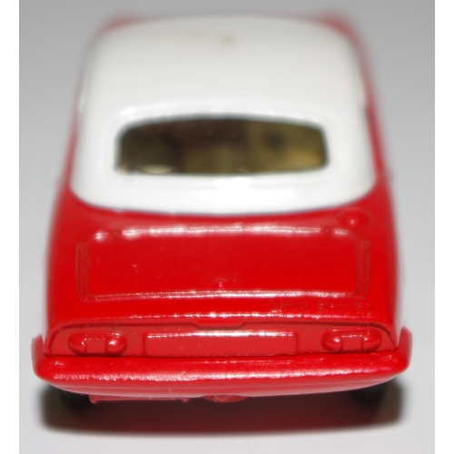 69 - Corgi Toys No.319 Lotus Elan Coupe with detachable chassis - red, white roof and interior, cast hubs... 