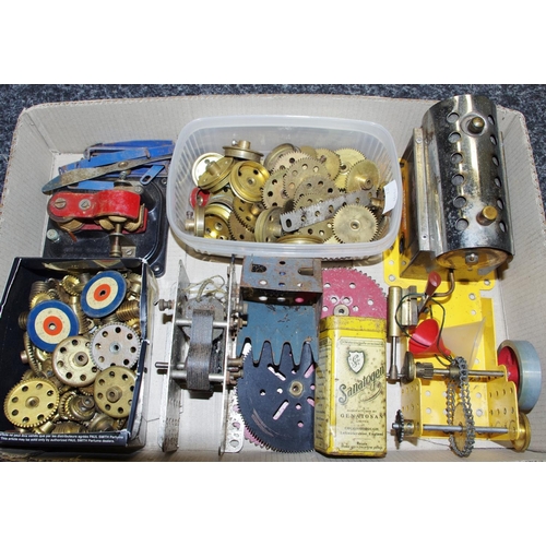 96 - Meccano including electric motor, steam engine, various brass parts including flanged wheels, gears ... 