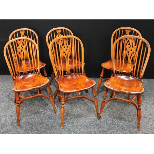 151 - A set of six oak and elm Windsor type dining side chairs, Crinoline stretchers (6)