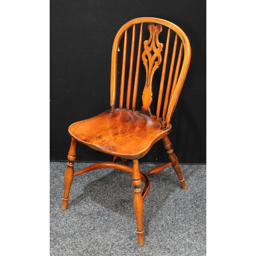 151 - A set of six oak and elm Windsor type dining side chairs, Crinoline stretchers (6)