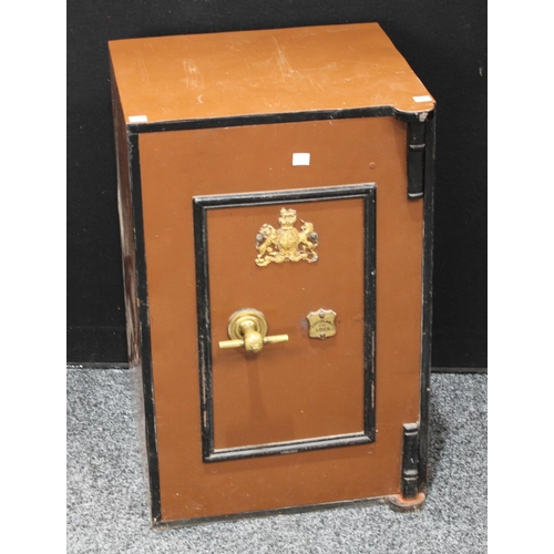 154 - A late 19th/early 20th century safe, labelled The Midland Safe Co, Manufacturers of Safes, Doors, Bo... 