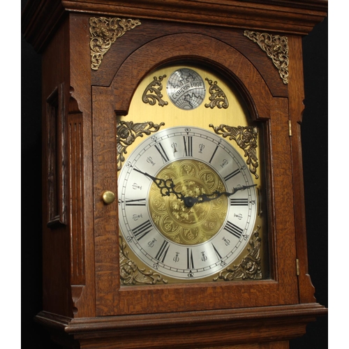 156 - A George III style oak longcase clock, the dial marked Tempus Fugit, 212cm high