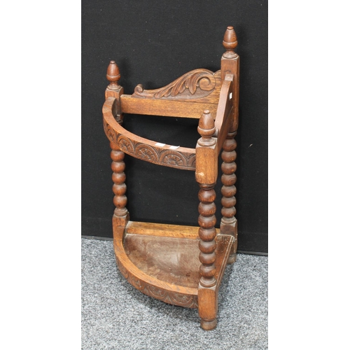 158 - A 17th century style oak corner walking stick/umbrella stand, bobbin-turned supports, 80cm high