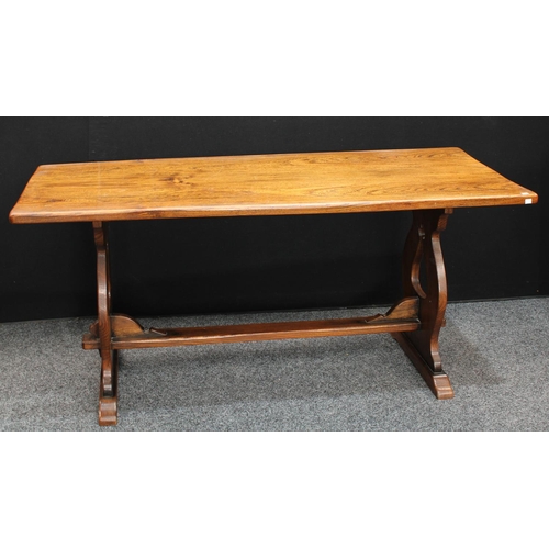 160 - A Gothic style oak refectory farmhouse trestle dining table, rectangular top, vasular end supports p... 