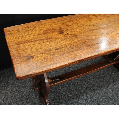 160 - A Gothic style oak refectory farmhouse trestle dining table, rectangular top, vasular end supports p... 