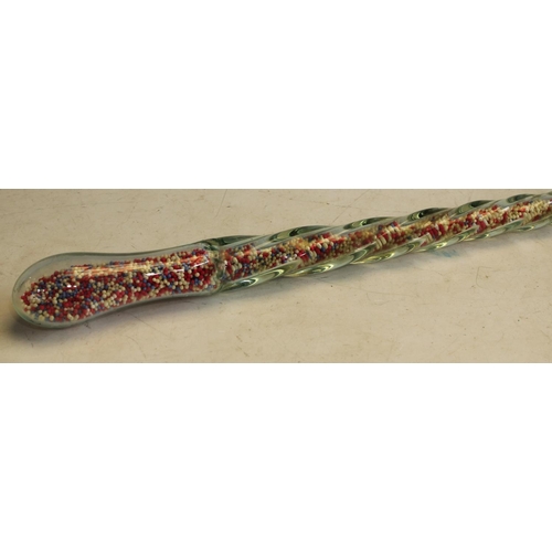 163 - A late 19th century glass frigger walking cane, barley twist filled with miniature glass beads