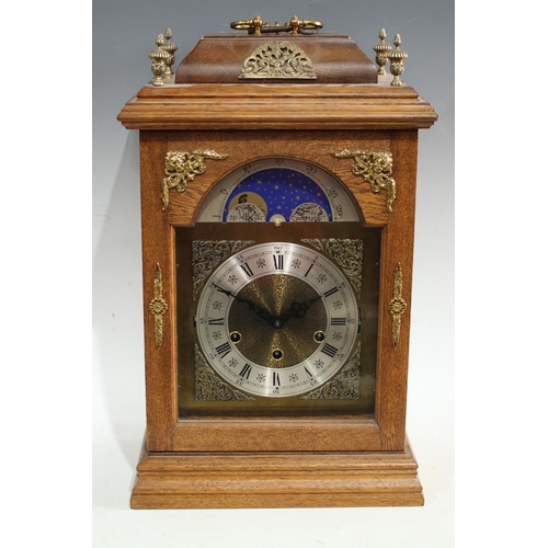 183 - A George III style oak cased 'bracket' clock, 16cm arched dial with moonphase, silvered chapter ring... 