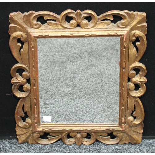 196 - A Florentine carved gilt wood mirror