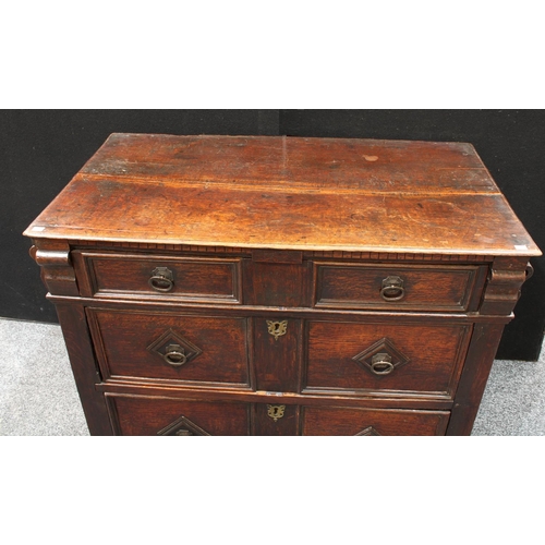 202 - A late 17th century oak block front chest, slightly oversailing rectangular top above a faux-dentil ... 