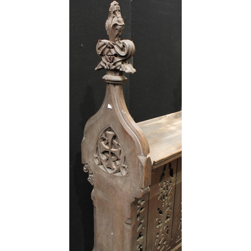 204 - Architectural Salvage - an ecclesiastical Gothic Revival oak lecturn/pulpit, shaped end supports cre... 